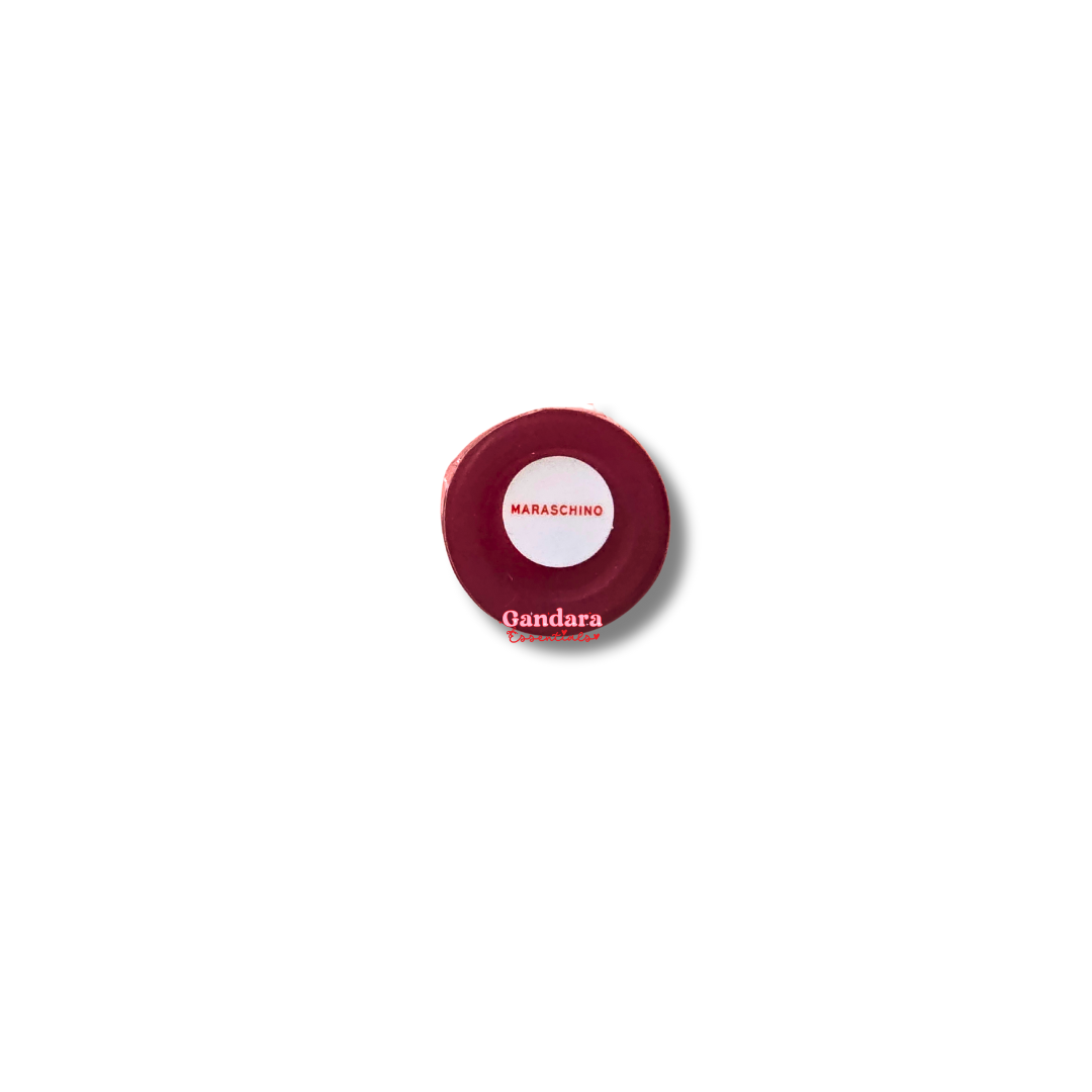 Revolution Maraschino Cherry Liquid Lipstick in a sleek tube, showcasing vibrant red color and smooth texture.