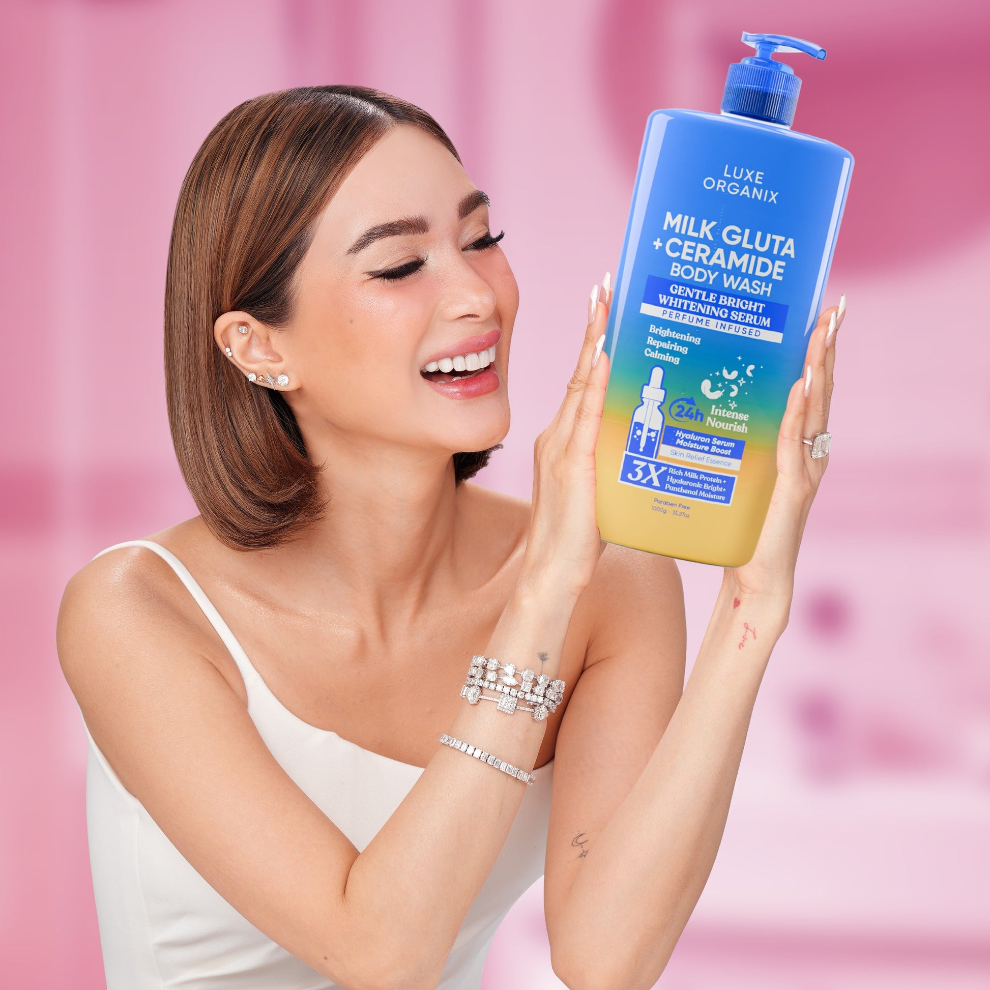 Luxe Organix Milk Gluta + Ceramide body wash in blue packaging, 1000g, showcasing a smooth, creamy texture.