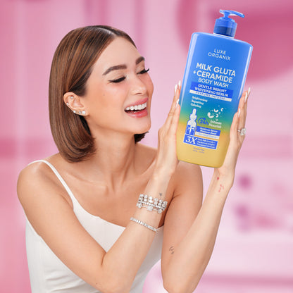 Luxe Organix Milk Gluta + Ceramide body wash in blue packaging, 1000g, showcasing a smooth, creamy texture.