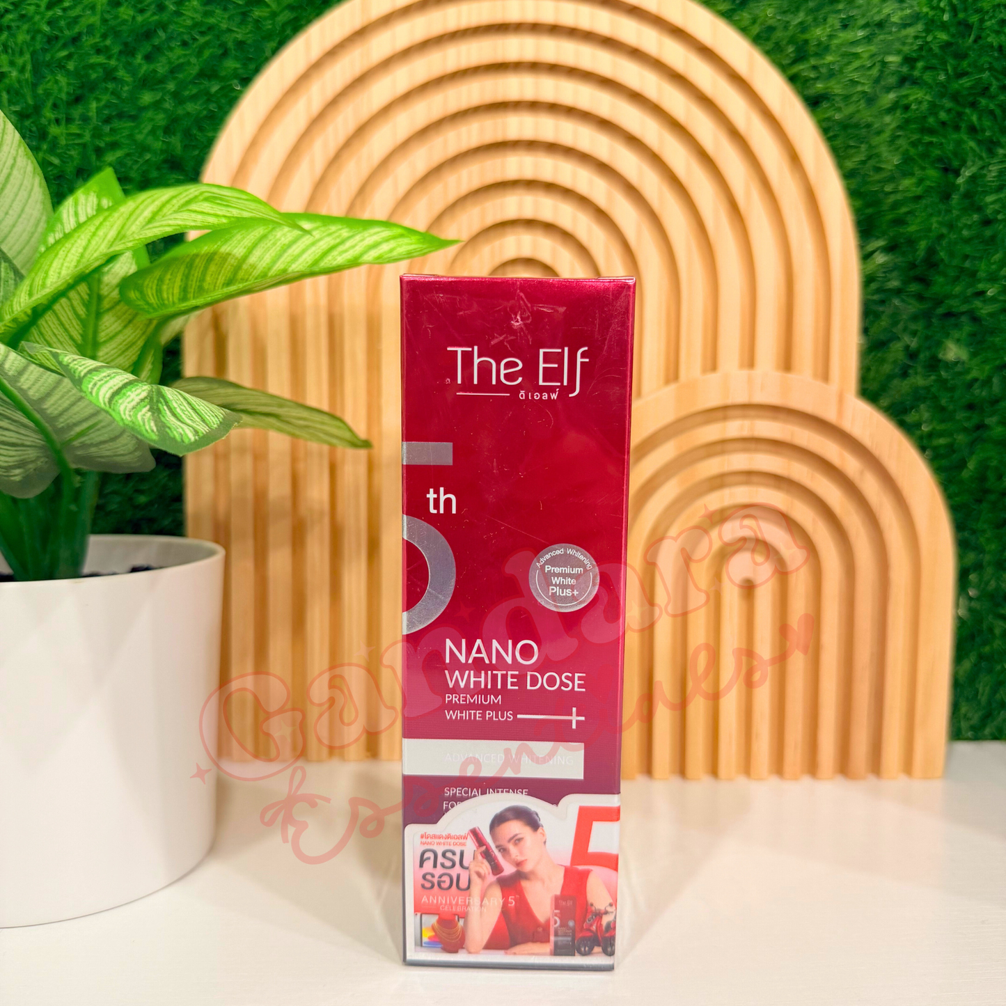 The Elf Nano White Dose Advanced Whitening Serum in a 60mL bottle, showcasing its sleek packaging and label design.