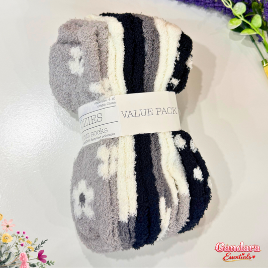 Six pairs of fuzzy women's socks from Gandara Essentials with colorful, cozy, and soft knit fabric for comfortable wear.