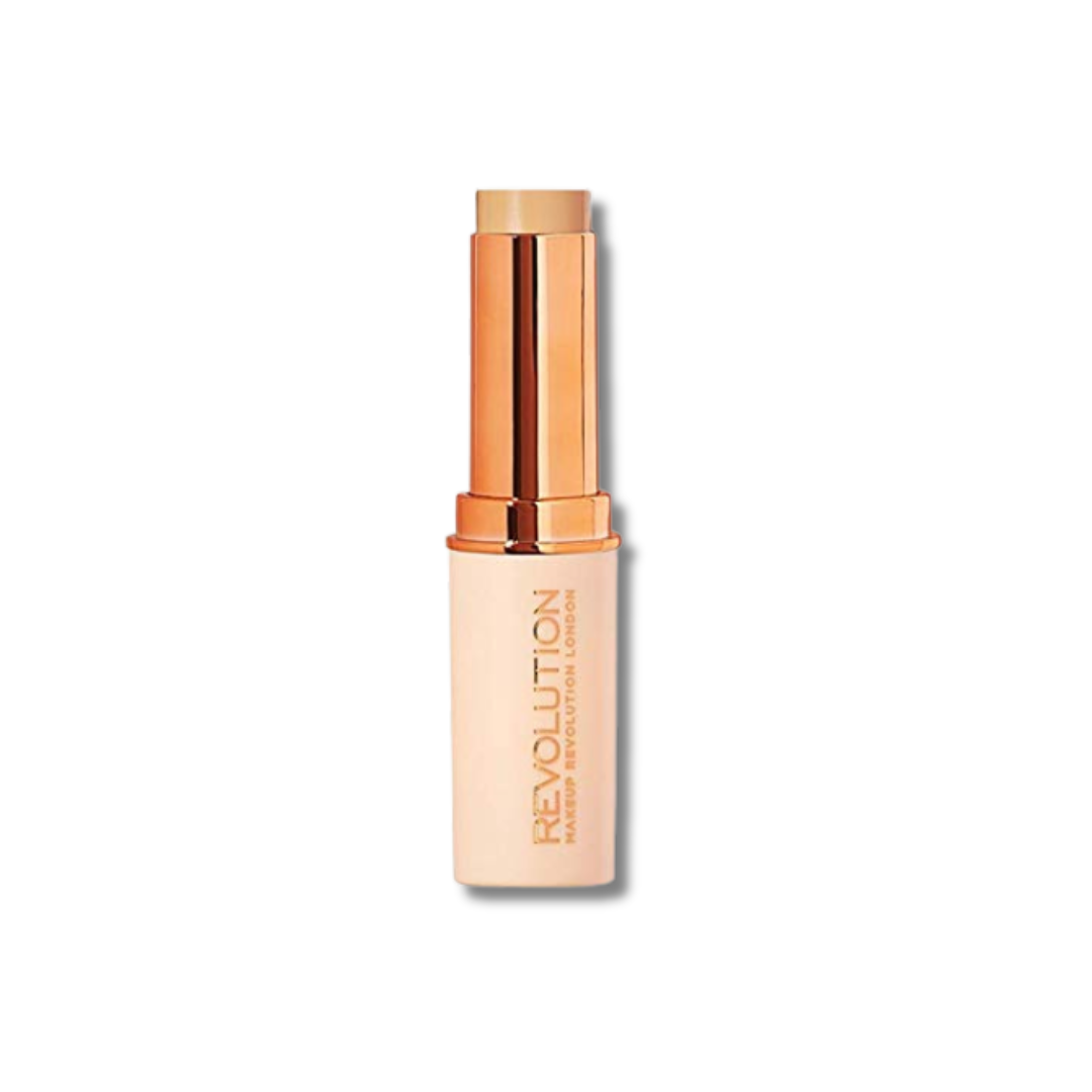 Revolution Fast Base Stick Foundation in a sleek tube, showcasing creamy texture and convenient portable design.