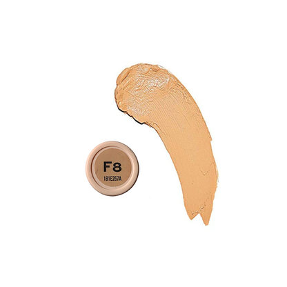 Revolution Fast Base Stick Foundation in a sleek tube, showcasing its creamy texture and shade for easy application.