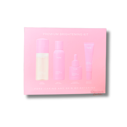 Fairy Skin premium brightening skincare set with cleanser, serum, and moisturizer in elegant packaging.