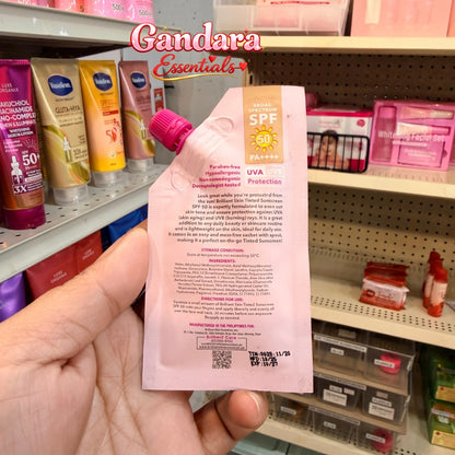 Brilliant Skin Essentials tinted sunscreen tube showing ingredients listing and product packaging in a close-up image.