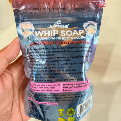 A Bonne Whip Soap with white rose and sakura ingredients, showing the soap's soft texture and floral ingredient details.
