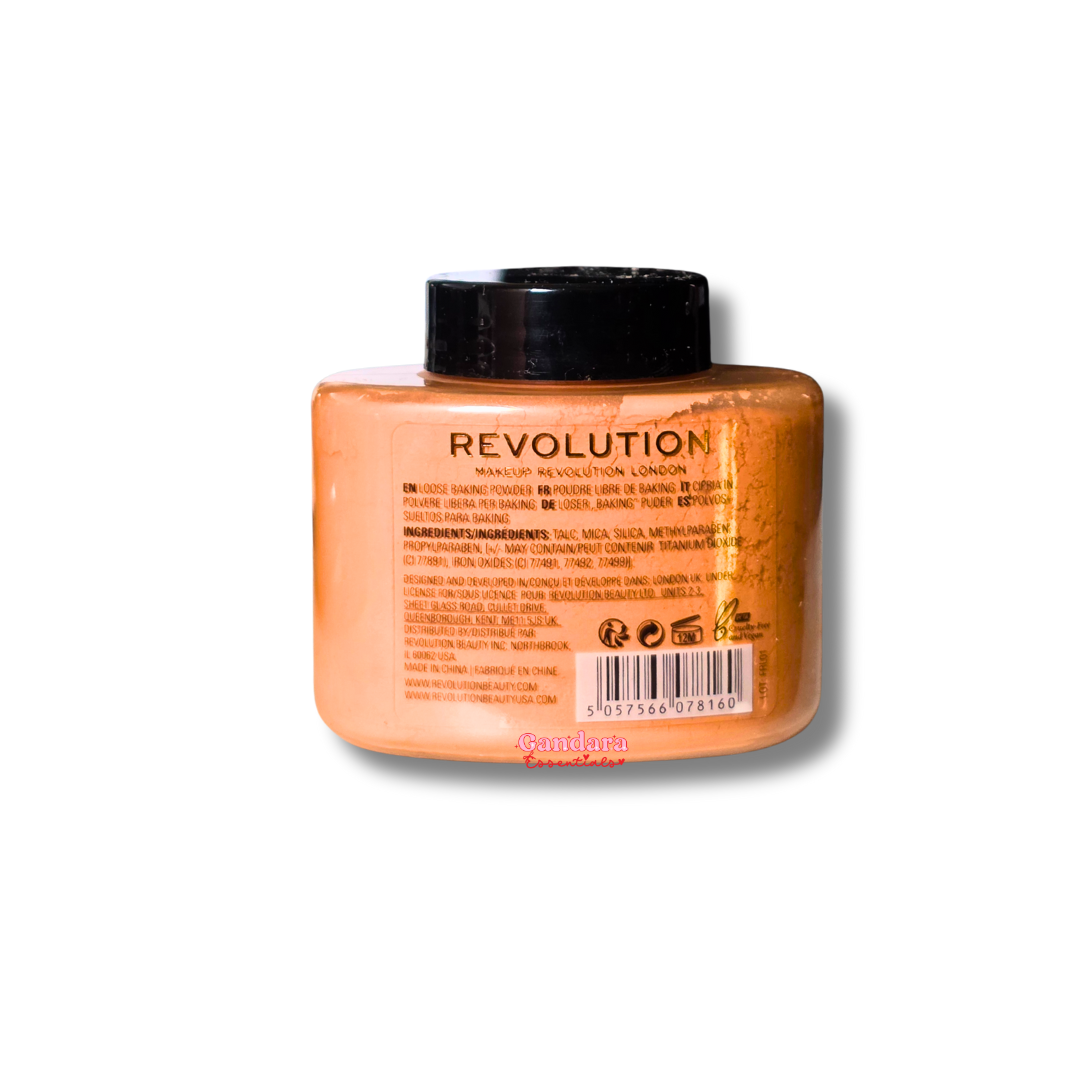 Revolution Luxury Baking Powder in Peach, 1.23 oz, displayed in a clear container with a vibrant peach color.