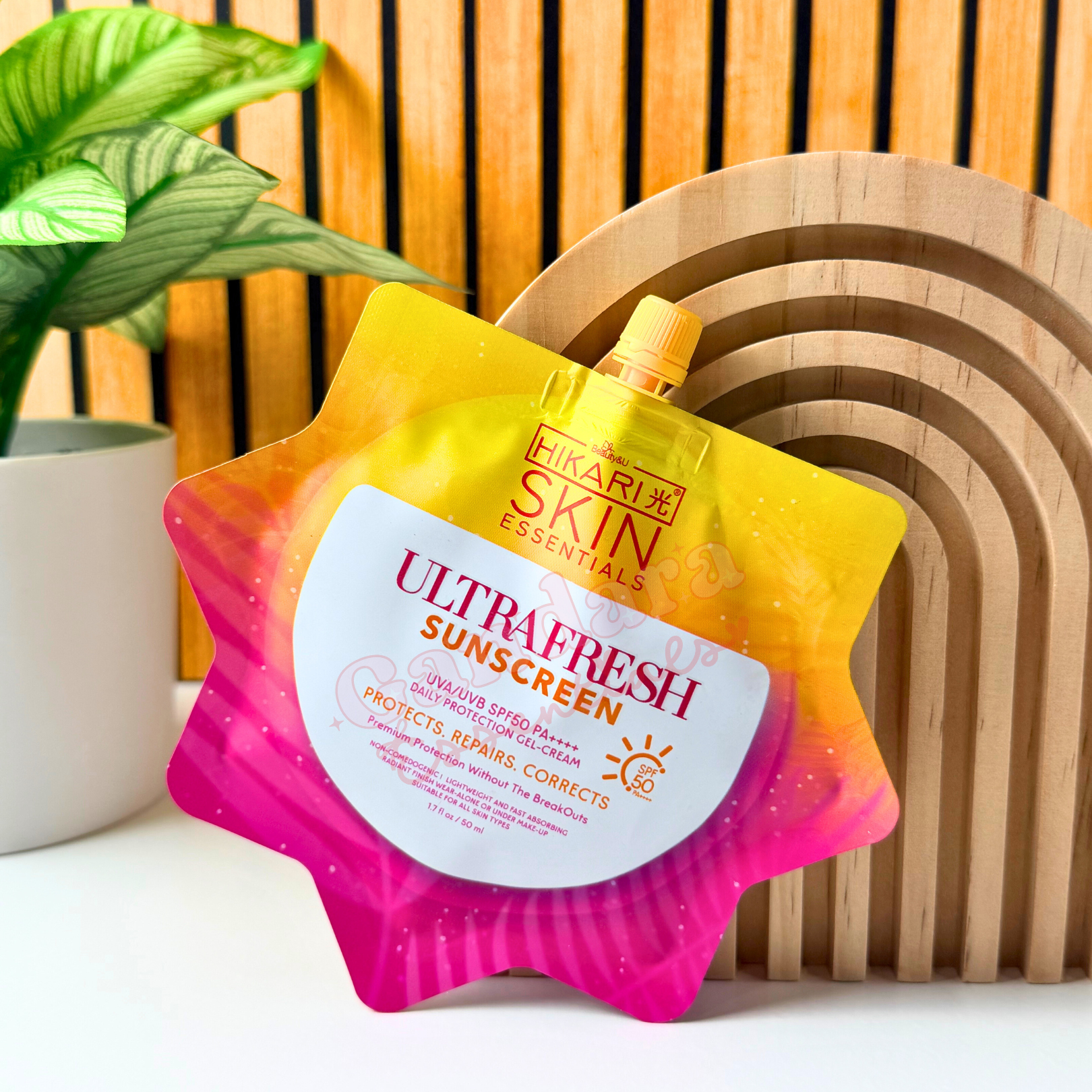 Hikari Skin Essentials Ultra Fresh Sunscreen sachet, 50mL, showcasing the product packaging with a fresh, lightweight texture.