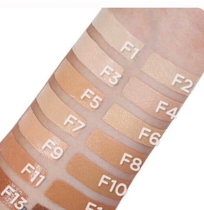 Revolution Fast Base Stick Foundation in a 0.21 oz tube, showcasing its creamy texture and sleek design.